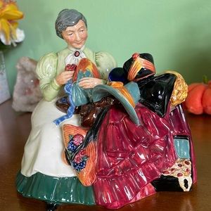 Offers Welcome! Royal Doulton “The Wardrobe Mistress” figurine.